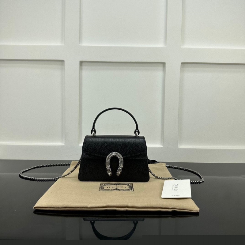 G*u*i top handle bags